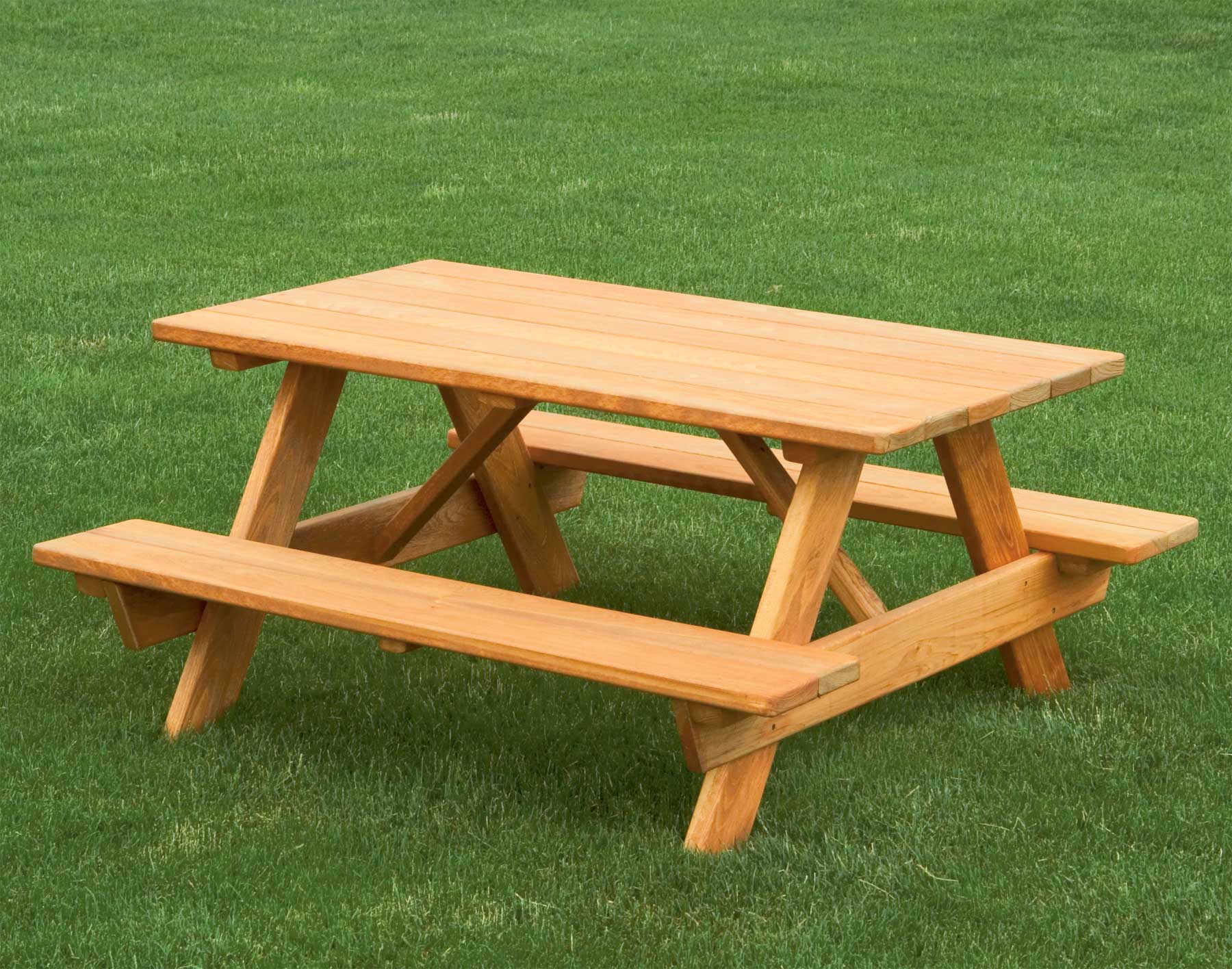 This picnic table has seating for adults, a high chair and ...