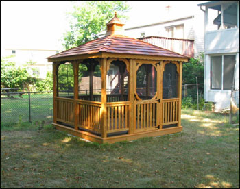 10 x 10 Square Treated Pine Gazebo Shown with Screens, Cedar Shake Shingles, and Cedar Stain/Sealer