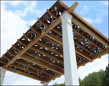 10 x 16 Solace Free Standing Pergola shown with Powder Coated Steel Privacy Panels with floral design