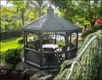12 Cedar Octagon Gazebo shown with Customer Supplied Paint, Screen Floor, Treated Pine Deck, Rooster Weathervane, Wavy fascia, 2x2 Square Railings, and Old English Pewter Asphalt Shingles.