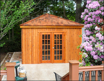 12 x 12 Cedar Rectangle Cabana shown with Plywood Floor, 60" 15-Lite Cedar French Doors, Four 40" x 46" Insulated Horizontal Sliding Window, Cedar Shake Shingles, Dome Skylight, 2 coats of Cedar Stain/Sealer, and Electrical Package. 