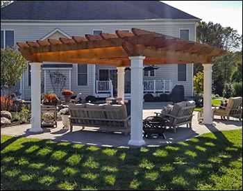 12 x 16 Rough Cut Oasis Pergola shown with Clear Stain/Sealer, Stainless Steel Hardware, 16" Top Runner Spacing, and Customer Supplied Lighting Kit.