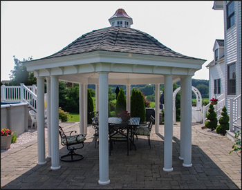 12 x 20 Vinyl Elongated Hexagon Belle Gazebo shown with 6 6" Columns, Cupola with Copper Roof and Charcoal Gray Asphalt Shingles 	