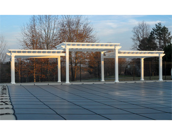 12 x 42 Vinyl 3-Tier Solace Free Standing Pergola shown with White Vinyl, 6" Top Runner Spacing, Galvanized Hardware, and Straight 8" Posts.