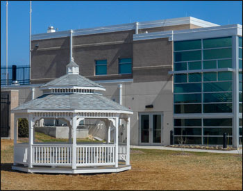 14 Vinyl Octagon Double Roof Gazebo shown with Gray Composite Deck, 1x1 Railings, Old English Pewter Asphalt Shingles, Hidden Wiring w/ 1 Receptacle & Switch, Full Set of 7 Benches