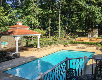  14 x 16 Double Roof Vinyl Ramada shown with no deck, 10" round posts, 6" post trim, solid half wall w/ lattice, cupola, cedar shingles, cedar tongue and groove ceiling with cedar tone stain sealer, sealed roof. Customer added mirrors.