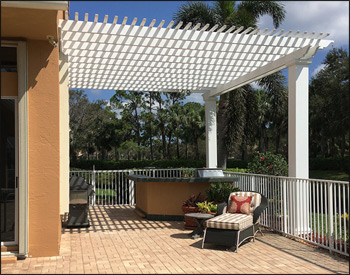 16 x 18 Fiberglass Vintage Classic Wall Mount Pergola shown with 6" top runner spacing, 2 -12”x12’ Square Duralite w/Tuscan poly cap/base sets, Hurricane Pkg / Engineered Drawings, and Sparta Rafter Tail Design.