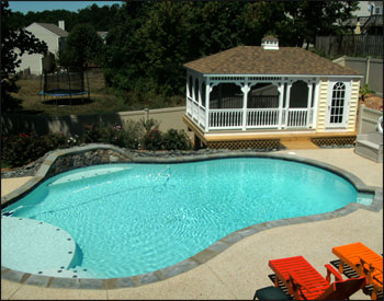 Custom (5’ enclosed) Pool House with Gray Composite Decking, Rustic Cedar Asphalt Shingles, Cupola, Optional Decorative Spindle Railings, Screens with Screen Door, Single Arched Door, Custom vinyl Siding 