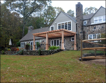 Custom 12x20 Cedar Deluxe 4 Beam Pergola Shown with Custom 8" Posts, Stainless Steel Hardware, No Corner Brackets, and 12" Top Runner Spacing 