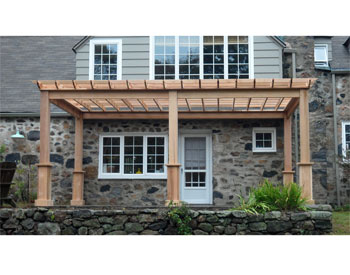 Custom 12x20 Cedar Deluxe 4 Beam Pergola Shown with Custom 8" Posts, Stainless Steel Hardware, No Corner Brackets, and 12" Top Runner Spacing 