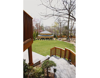 Custom 30 Treated Pine Dodecagon Double Roof Gazebo Shown with 9 Tall Posts, 36" High Solid Bottom Railing, Solid Top Rail, Standard Braces, 4 Track Window System with Screens, Screened Floor, Black Plexiglas at Double Roof, Grey Composite Decking, No Cupola, and Oxford Grey Asphalt Shingles.