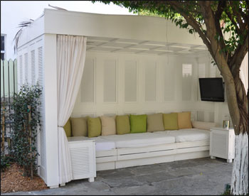 Custom 7 x 15 Treated Pine Cabana shown with Custom Exterior Louvers, Curved Fascia, Hurricane Package, White Paint, and Marine Grade Plywood Ceiling with Cedar Battens.  