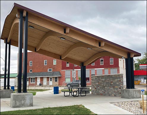 30 X 30 Lam-Wood Long Island Wave Bandshell Shown With Powder coated tube steel quad columns, and 26 gauge exposed fastener metal roofing