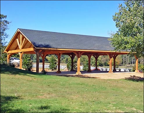 Custom 30 x 50 Large Timber Rough Cut Cedar Ramada with Short Post Trim, 8x8 Posts, 6x12 Headers, 3x8 Rafters, 1x6 Tongue & Groove Roof Decking, 6" Taller Posts, and Dual Black Asphalt Shingles.