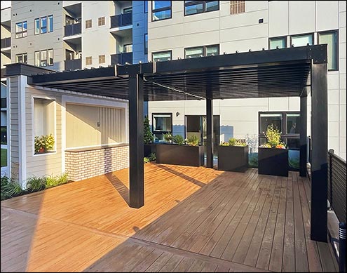 Custom 15 4" x 21 Wall Mounted Modern Vinyl Pergola shown with Black Vinyl, 10 Tall 8"x8" Vinyl Columns, Short Post Trim, and Powder Coated Black Metal Corner Braces with Black Screws