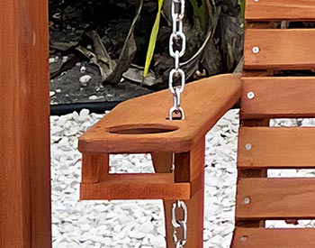 Red Cedar Cup Holder shown an American Classic Porch Swing with Cedar Stain/Sealer.