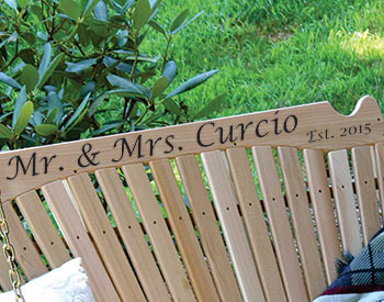 Personalized Text shown on an unstained Cedar Fanback swing. 
