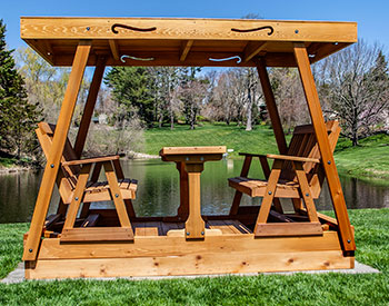 Red Cedar Carriage Roller Glider Shown with English Garden Benches, Stainless Steel Hardware, and Optional Cedar Stain/Sealer