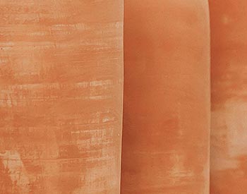 Close up of ceramic vessels before glazing and firing