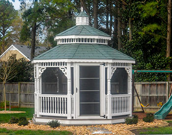  10 Vinyl Octagon Double Roof Gazebo shown with Earth Green Rubber Slate Shingles, 4-Track Window System, Gray Composite Deck, Decorative Posts, Electrical Package, Decorative Braces, and Decorative 2x2 Rails. 