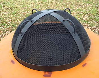 Spark Guard Shown on a Fire Pit in a Closeup.