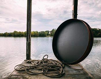 40" Steel Table Top Lid Shown From the Bottom, Propped up on a Dock.