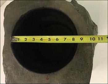 Hollow leg cavity shown in a closeup of the measurement of the width of the cavity.