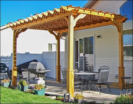 8' x 16' Treated Pine Vintage Classic Pergola shown with 2 Coats of Cedar Tone Stain/Sealer, 12" Top Runner Spacing, 36" High Post Trim, and a Lattice Top.