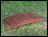 White Cedar Stained Arched Plank Bridge