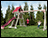 Adventure Vinyl Swing & Slide Playset w/ Rock Wall