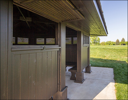 Custom 21’ x 21’ Cedar Marquee Shelter with Customer supplied stain, custom shutters, and cedar rails