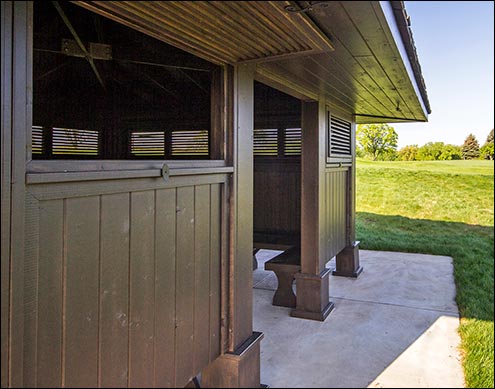 Custom 21’ x 21’ Cedar Marquee Shelter with Customer supplied stain, custom shutters, and cedar rails