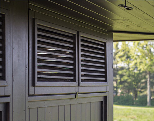 Custom Florida Shutters shown with Customer supplied stain