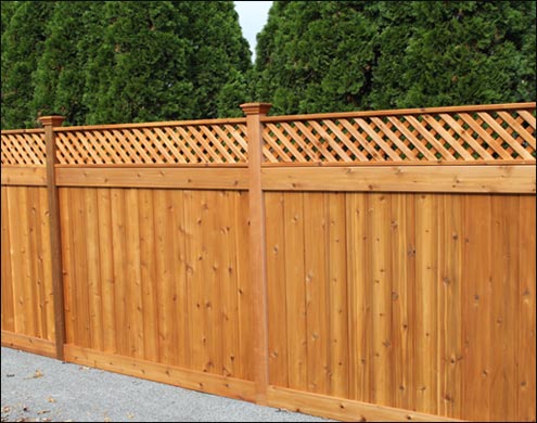 Western Red Cedar English Lattice Style Fence with flat top post caps, 12 inch diagonal lattice, and Cedar Stain/Sealer shown. Shown in standard 6 height and 6 width between posts. <br/>(Also available in Treated Pine)