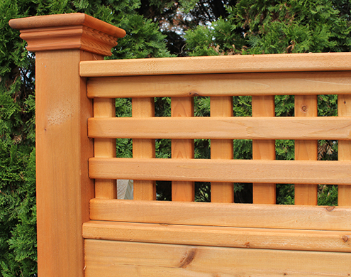 Close up of 12 inch Western Red Cedar straight lattice shown with<br/> Cedar Stain/Sealer and flat top post cap.(Also available in Treated Pine)